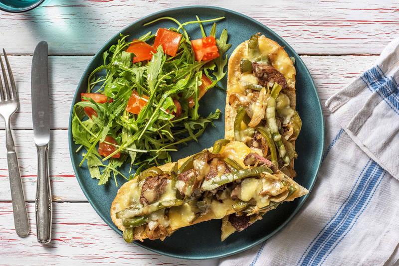 Baguette au bœuf émincé, aux poivrons et au fromage