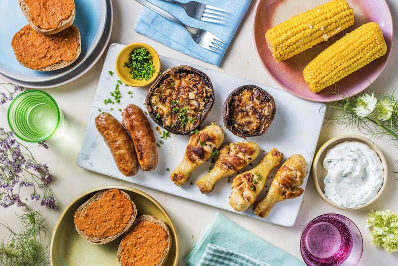 Planche BBQ avec saucisses Brandt & Levie et pilons de poulet