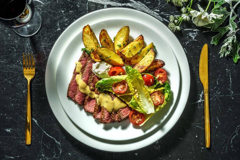 Entrecôte & pommes de terre rôties à l'ail et au persil
