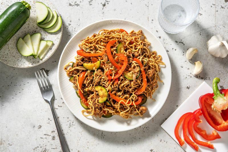Wok de nouilles au porc effiloché