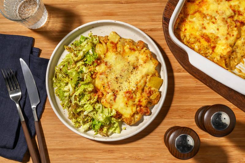 Gratin des pistes : cantal AOP & saucisse fumée